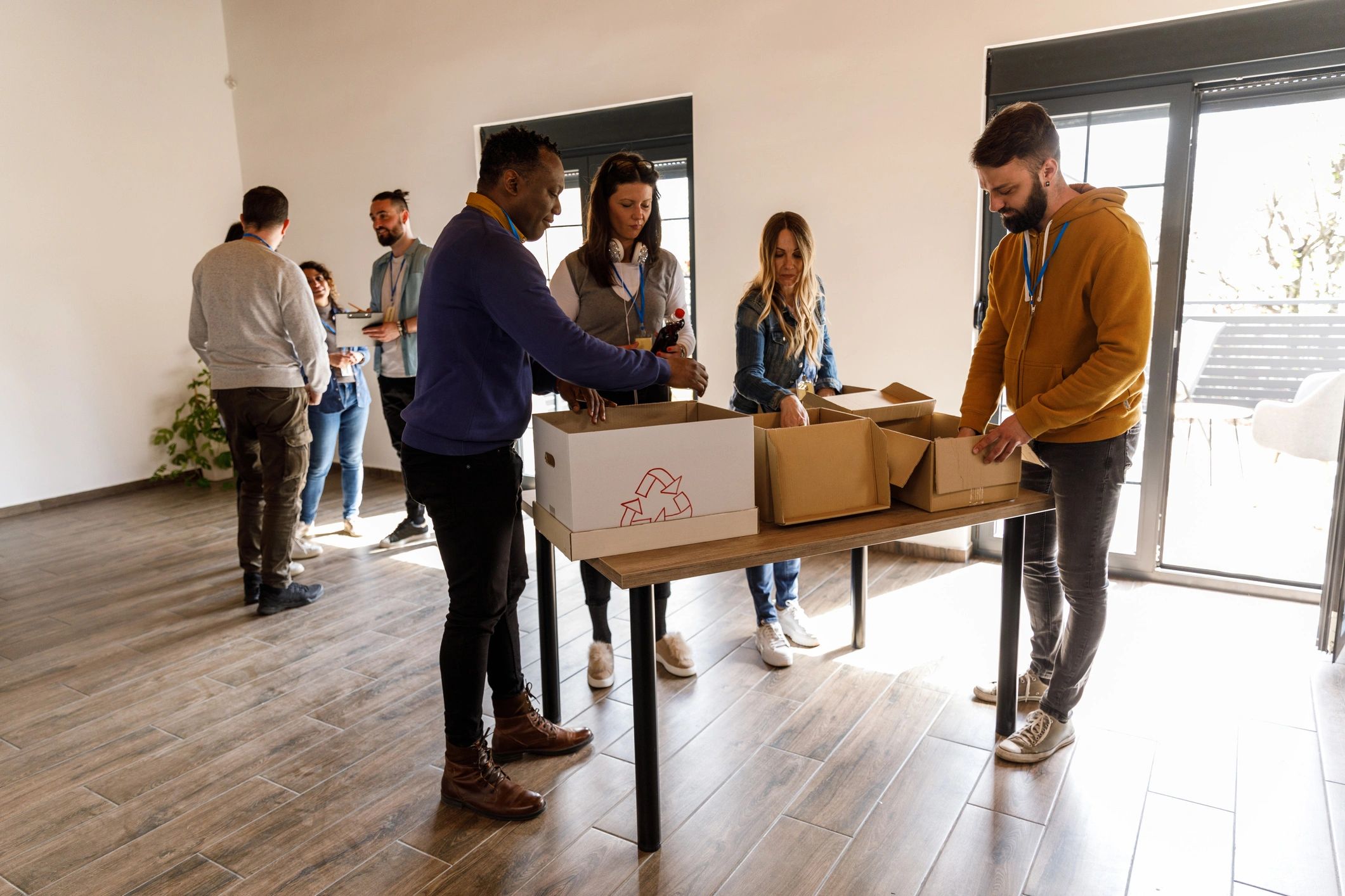 Volunteers sorting donation boxes for relief efforts
